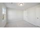 Bright bedroom with two windows and neutral gray carpeting at 501 Hanover Shore Ln, Raleigh, NC 27610