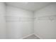 Walk-in closet with wire shelving for storage at 501 Hanover Shore Ln, Raleigh, NC 27610