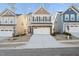 Two-story home with neutral siding and a two-car garage at 501 Hanover Shore Ln, Raleigh, NC 27610