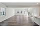 Open living space with hardwood floors and lots of natural light at 501 Hanover Shore Ln, Raleigh, NC 27610