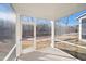 Screened porch overlooking backyard and trees at 501 Hanover Shore Ln, Raleigh, NC 27610