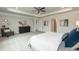 Spacious main bedroom with neutral tones and a view of ensuite bathroom, closet and entry hall at 514 Glenkirk Pl, Garner, NC 27529