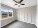 Cozy bedroom with ceiling fan and carpet at 55 Oxer Dr, Youngsville, NC 27596