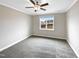 Spacious bedroom with carpet and window at 55 Oxer Dr, Youngsville, NC 27596