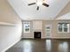 Bright living room featuring hardwood floors and a fireplace at 55 Oxer Dr, Youngsville, NC 27596