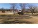 Aerial view of home with spacious backyard and trees at 5765 G Snow Camp Rd, Graham, NC 27253