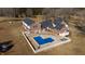 Aerial view of home, pool, and expansive grounds at 5765 G Snow Camp Rd, Graham, NC 27253