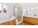 Elegant bathroom with double vanity, soaking tub, and walk-in shower at 5765 G Snow Camp Rd, Graham, NC 27253