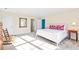 Charming bedroom with king-size bed and en-suite bathroom access at 5765 G Snow Camp Rd, Graham, NC 27253