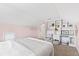 Bedroom with built-in shelves and a bed at 5765 G Snow Camp Rd, Graham, NC 27253