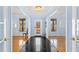 Bright entryway with hardwood floors and a view to the backyard at 5765 G Snow Camp Rd, Graham, NC 27253