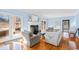 Cozy Gathering room with fireplace, hardwood floors, and French doors at 5765 G Snow Camp Rd, Graham, NC 27253