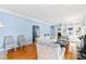 Gathering room with built-in shelving, fireplace, and comfortable seating at 5765 G Snow Camp Rd, Graham, NC 27253