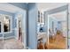 Bright hallway with built-in desk and access to other rooms at 5765 G Snow Camp Rd, Graham, NC 27253