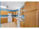Efficient kitchen featuring ample cabinetry and a window overlooking the backyard at 5765 G Snow Camp Rd, Graham, NC 27253