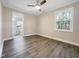 Bedroom with access to a full bathroom and hardwood floors at 6307 Tryon Rd, Cary, NC 27518