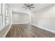 Spacious living room with hardwood floors and lots of natural light at 6307 Tryon Rd, Cary, NC 27518