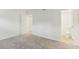 Spacious bedroom with neutral carpet, white walls, and two closets; ready for personalization at 642 Pine Ridge Pl, Raleigh, NC 27609