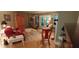Finished basement with comfortable seating and access to patio at 7115 Laurel Point Dr, Gibsonville, NC 27249