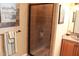 Bathroom with shower, tiled walls, and neutral color scheme at 7115 Laurel Point Dr, Gibsonville, NC 27249