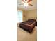 Bright bedroom with a queen-size bed and large window at 7115 Laurel Point Dr, Gibsonville, NC 27249