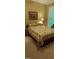 Cozy bedroom with a queen bed and window with blinds at 7115 Laurel Point Dr, Gibsonville, NC 27249