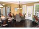 Bright breakfast nook with table and chairs near the kitchen at 7115 Laurel Point Dr, Gibsonville, NC 27249