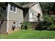 Brick and board house exterior with landscaping at 7115 Laurel Point Dr, Gibsonville, NC 27249