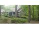 House exterior showcasing stonework and landscaping at 7115 Laurel Point Dr, Gibsonville, NC 27249
