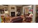 Comfortable living room with fireplace and built-in shelving at 7115 Laurel Point Dr, Gibsonville, NC 27249