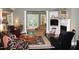 Spacious living room with fireplace, built-ins, and ample seating at 7115 Laurel Point Dr, Gibsonville, NC 27249