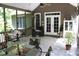 Screened porch with access to the backyard at 7115 Laurel Point Dr, Gibsonville, NC 27249