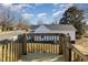 Elevated view of backyard, showing a street and trees at 801 N Mebane St, Burlington, NC 27217