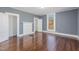 Hardwood floors and neutral walls in this bedroom at 801 N Mebane St, Burlington, NC 27217