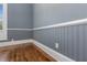 Gray walls and hardwood floors in this dining room at 801 N Mebane St, Burlington, NC 27217