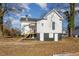 Rear exterior view of house, showing stairs and basement at 801 N Mebane St, Burlington, NC 27217
