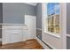 Living room with hardwood floors and backyard view at 801 N Mebane St, Burlington, NC 27217