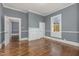 Living room featuring hardwood floors and fireplace at 801 N Mebane St, Burlington, NC 27217