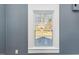 View from a window showing a residential neighborhood at 801 N Mebane St, Burlington, NC 27217