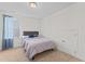 Cozy bedroom with window and neutral color palette at 803 Golden Plum Ln, Zebulon, NC 27597