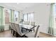 Casual dining area with large windows and seating for six at 803 Golden Plum Ln, Zebulon, NC 27597
