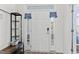Inviting entryway with a modern front door and storage at 803 Golden Plum Ln, Zebulon, NC 27597