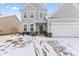 Two-story home with gray siding and two-car garage at 803 Golden Plum Ln, Zebulon, NC 27597
