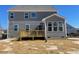 Gray home exterior with deck and sunroom addition at 85 N Stagecoach Dr, Wendell, NC 27591