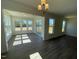 Dining room with large windows and view of sunroom at 85 N Stagecoach Dr, Wendell, NC 27591
