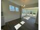 Dining room with modern chandelier and windows at 85 N Stagecoach Dr, Wendell, NC 27591