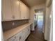 Pantry features white cabinets with lots of shelving and counter space at 85 N Stagecoach Dr, Wendell, NC 27591