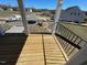 View of a wooden porch with railings at 85 N Stagecoach Dr, Wendell, NC 27591