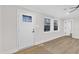 Inviting entryway with a charming stained-glass door and hardwood floors at 919 Fiske St, Durham, NC 27703