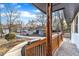 Inviting front porch with wooden railing and view of neighborhood at 919 Fiske St, Durham, NC 27703